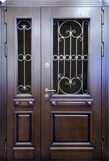 Металлическая полуторная термодверь со стеклами и коваными решетками (отделка панелями МДФ шпон) Металлическая полуторная термодверь со стеклами и коваными решетками (отделка панелями МДФ шпон)